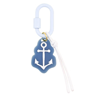 Keychain with anchor design on a beige background